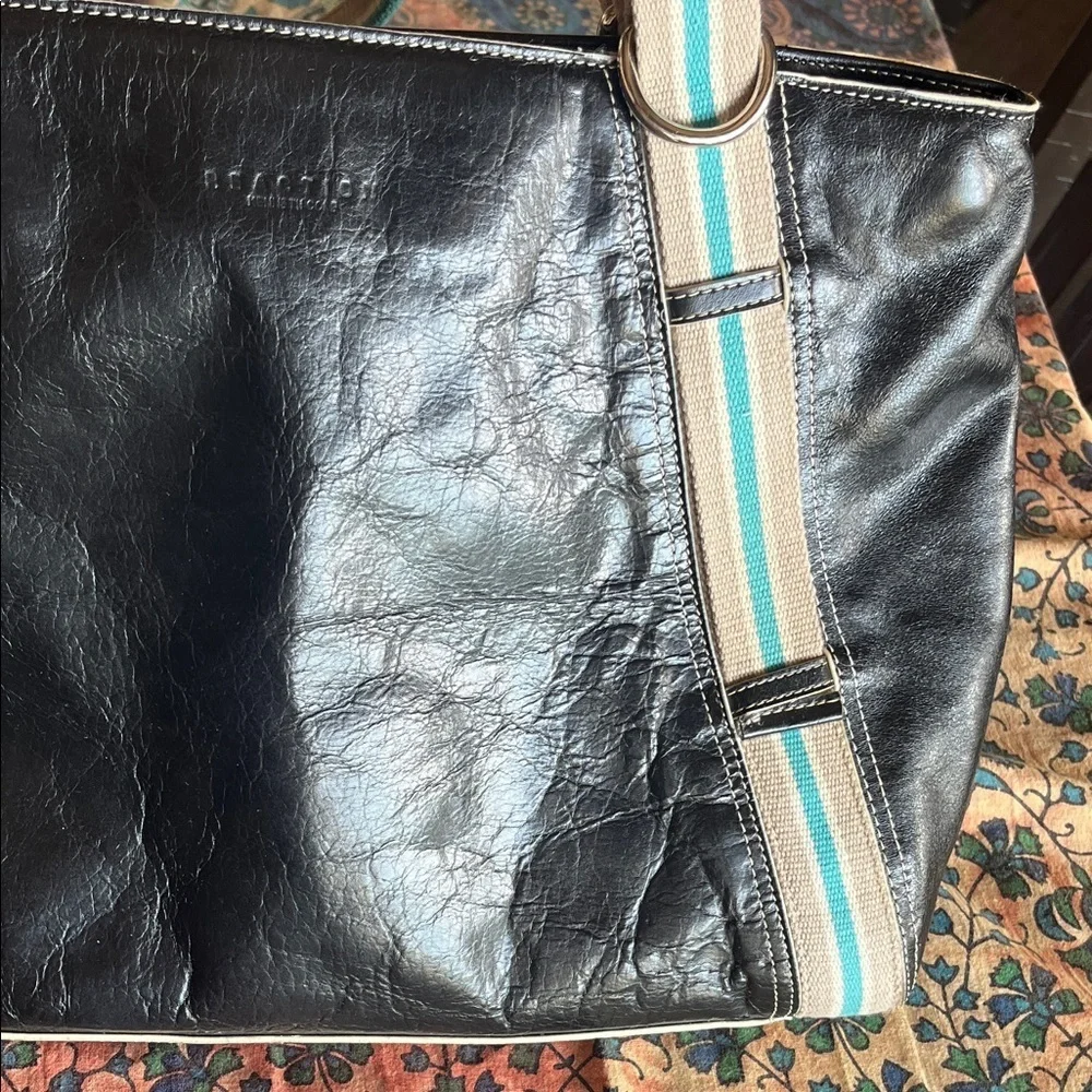 Reaction Kenneth Cole sleek black